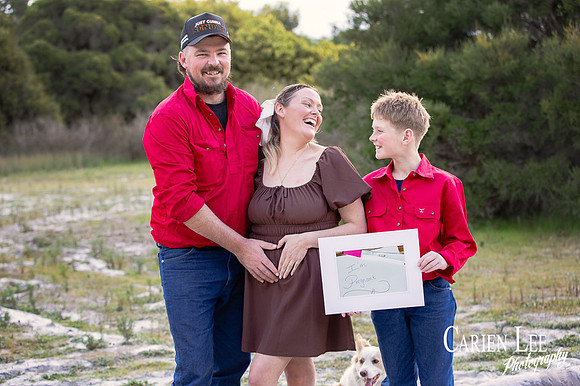 Surprise pregnancy announcement moment captured during Bunbury couple's session
