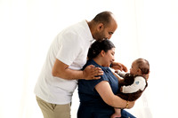 Baby making eye contact with grandparents during Bunbury family photo session