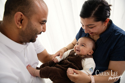 4 month old baby boy smiling during family photography session in Bunbury
