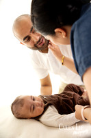 Close-up of 4 month old baby's genuine smile during milestone photography session