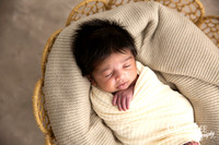 Newborn baby Isaiah wrapped in soft blanket during Bunbury newborn photography session