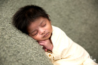 Newborn baby Isaiah wrapped in soft blanket during Bunbury newborn photography session