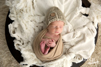 Newborn baby's peaceful sleeping face during professional Bunbury photo session