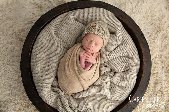 Tiny sleeping newborn baby posed on soft blanket, Bunbury newborn photography