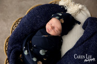 Close-up of newborn baby's tiny fingers resting peacefully, Bunbury newborn photographer