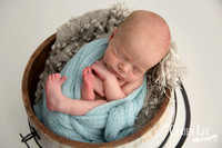 Newborn baby sleeping in wooden bowl prop, Bunbury newborn photographer