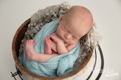 Newborn baby sleeping in wooden bowl prop, Bunbury newborn photographer