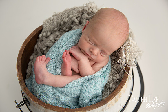 Newborn baby sleeping in wooden bowl prop, Bunbury newborn photographer