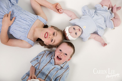 A fun portrait of 3 siblings during a family photo session in Bunbur