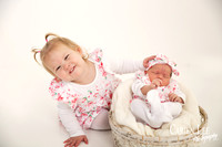 cute older sibling love during a newborn session in Bunbury