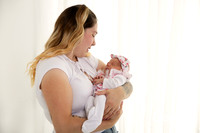 photo of a mum and newborn girl