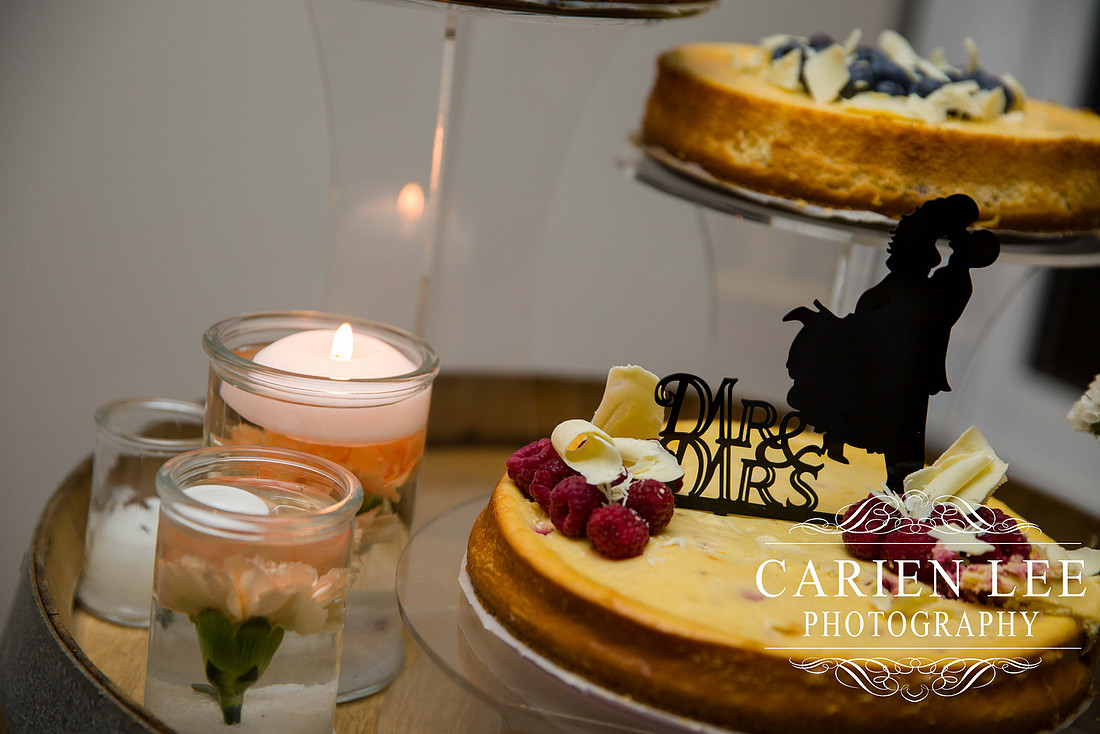 Bride and groom cutting the cake at busselton wedding