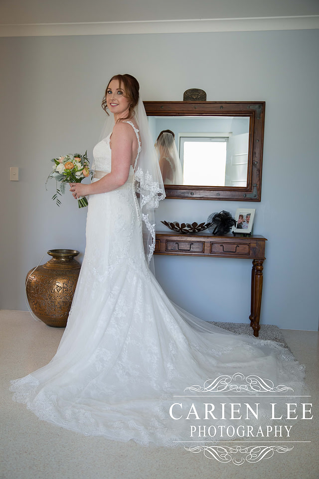 Bride in dress and train before Busselton Wedding