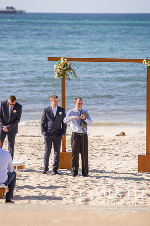 Groom and groomsmen waiting for bride at Busselton Jetty beach wedding