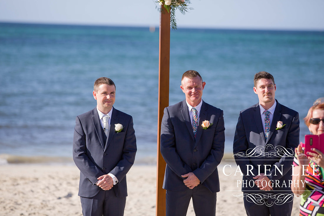 Groomsmen waiting for ceremony to start at Busselton Beach Wedding