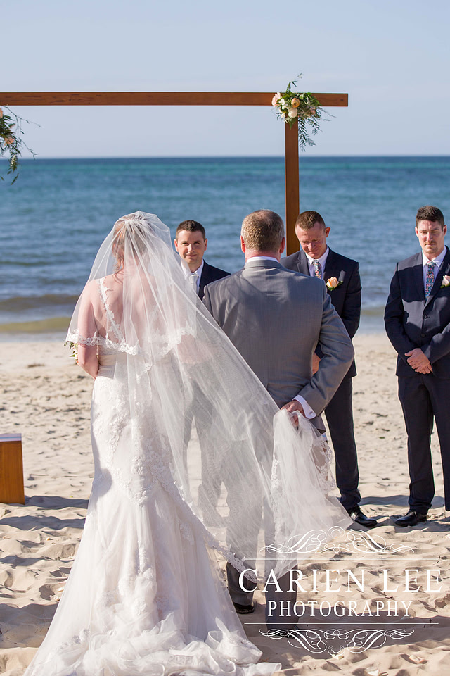 Bride arriving at beach wedding in Busselton