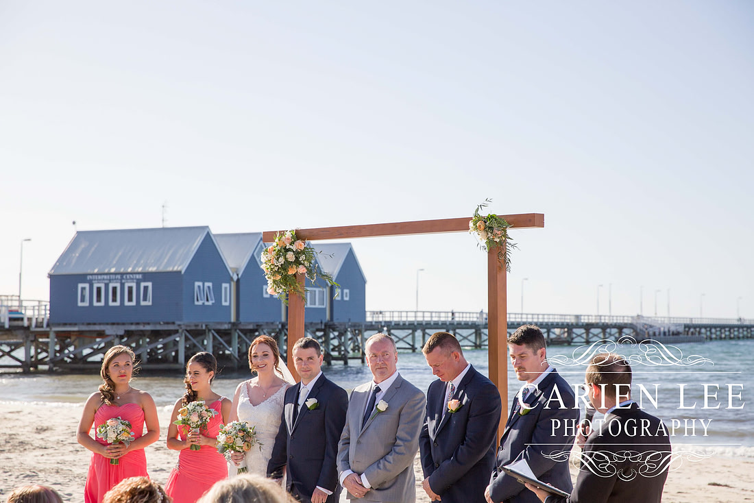 Bridal party in front of the Busselton Jetty on a busselton beach wedding