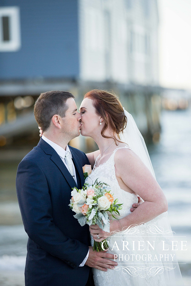 Beautiful bride on beach in busselton in front of busselton jetty
