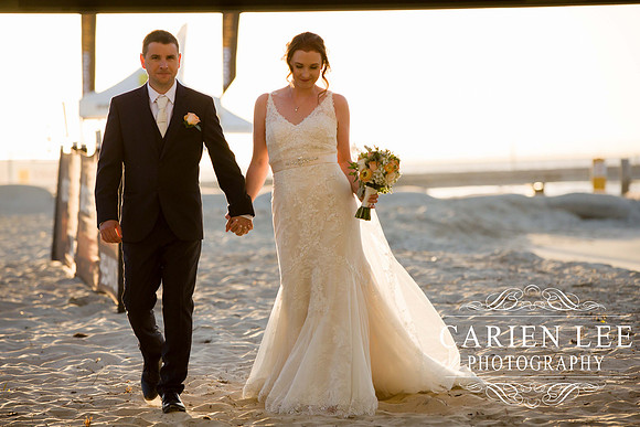 Beautiful bride on beach in busselton in front of busselton jetty