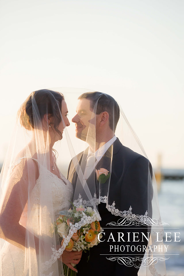 Beautiful bride on beach in busselton in front of busselton jetty