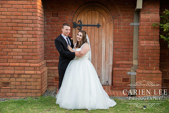Bride and groom walking on the beach during a Pinjarra wedding photoshoot
