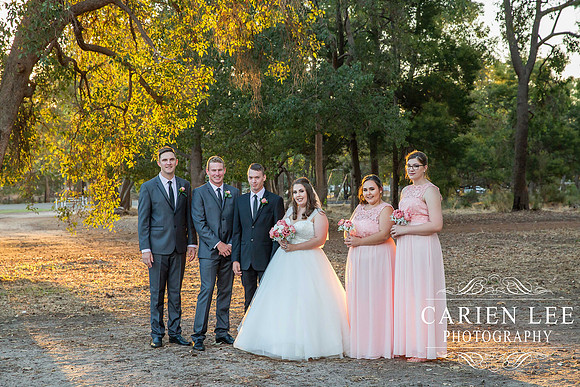 Couple exchanging vows at Pinjarra wedding venue