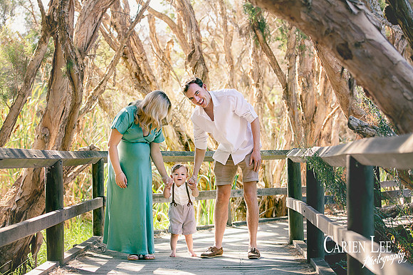 Exciting couple and their child expecting their 2nd baby