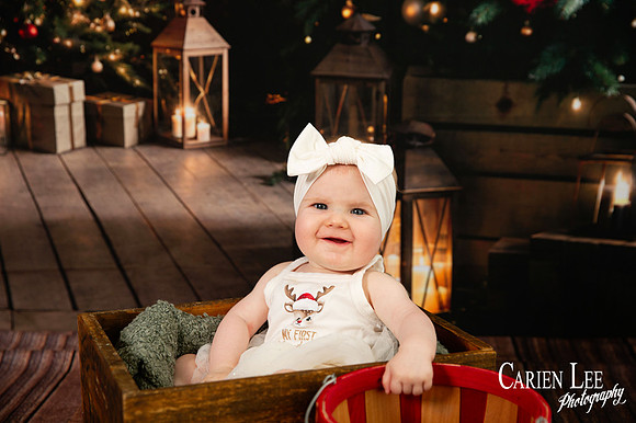 Child sitting on Santa’s lap for Christmas photo Bunbury