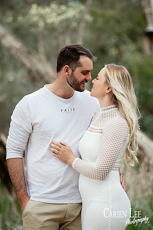 Couple holding hands during engagement photography session in Eaton