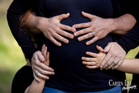 Pregnant belly and excited siblings