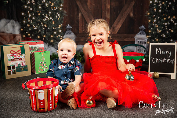 Festive Christmas photo of child with Santa Bunbury