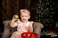 Child smiling with Santa during Bunbury Christmas mini session