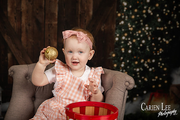 Child smiling with Santa during Bunbury Christmas mini session