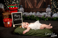 Child sitting on Santa?s lap for Christmas photo Bunbury