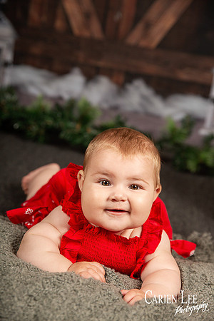 Child smiling with Santa during Bunbury Christmas mini session