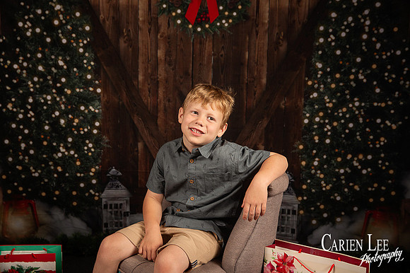 Child sitting on Santa?s lap for Christmas photo Bunbury