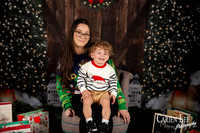 Child sitting on Santa?s lap for Christmas photo Bunbury