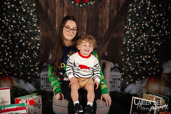 Child sitting on Santa?s lap for Christmas photo Bunbury