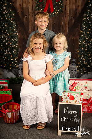 Child sitting on Santa?s lap for Christmas photo Bunbury