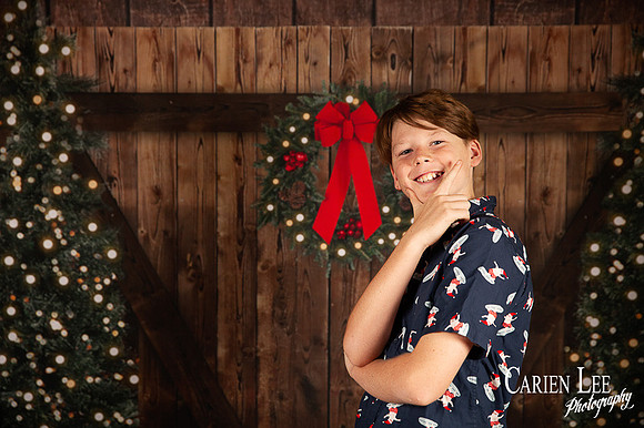 Child smiling with Santa during Bunbury Christmas mini session