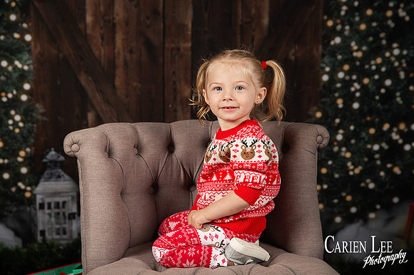Festive Christmas photo of child with Santa Bunbury