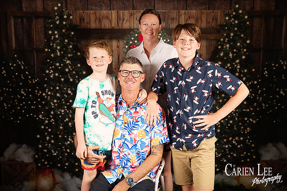 Child sitting on Santa?s lap for Christmas photo Bunbury