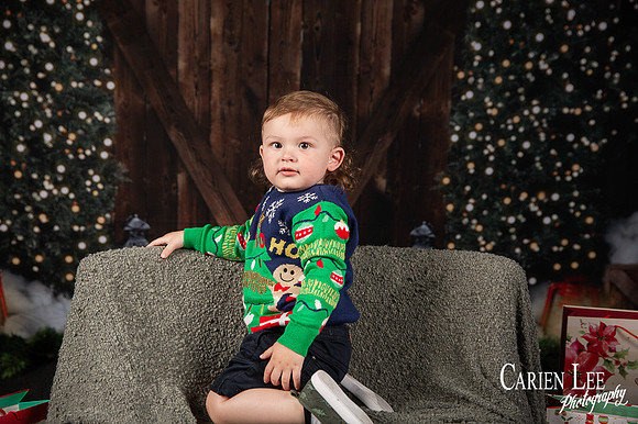 Child sitting on Santa?s lap for Christmas photo Bunbury