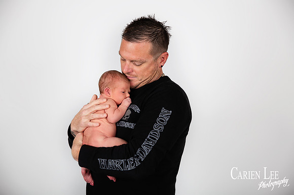 Father and newborn baby in Bunbury studio