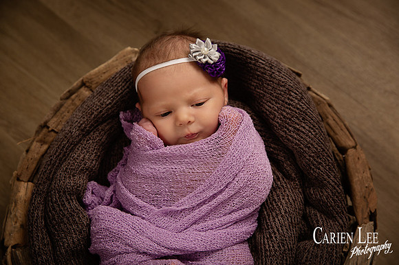 photo of a baby wrapped during Bunbury newborn session