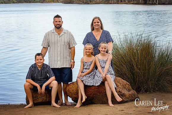 Family of four enjoying outdoor photography session in Bunbury