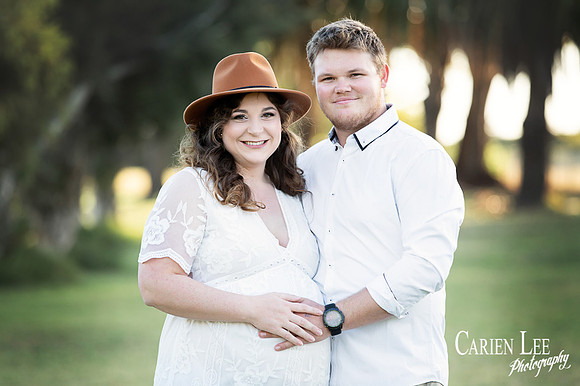 pregnant couple during a maternity photo shoot
