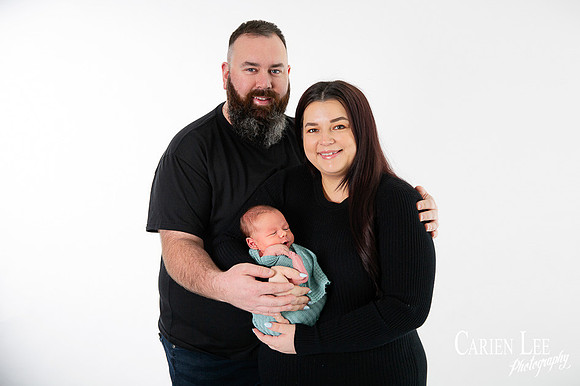 Family of four enjoying outdoor photography session in Bunbury