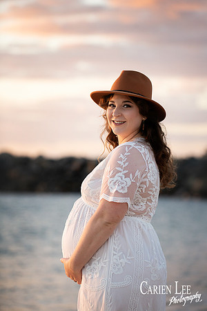 Pregnant woman during photo session on beach near Bunbury